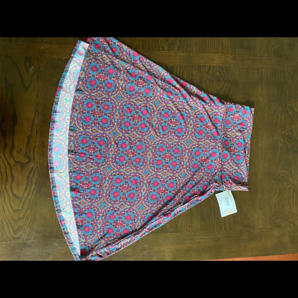 Lularoe Azure Skirt. Size XS and never tried on. BEAUTIFUL!